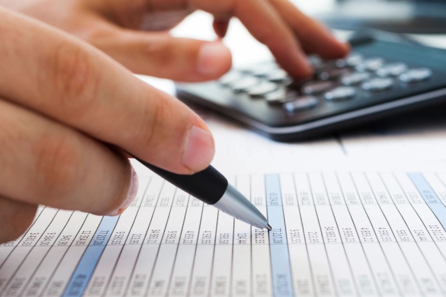 Accountant reviewing financial spreadsheet data